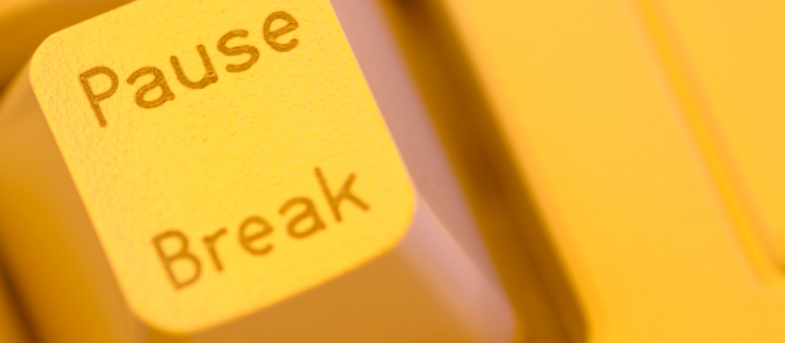 Photo of the pause/break button on a computer keyboard