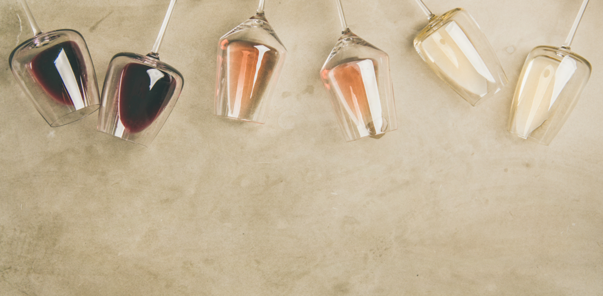 Photo of six wine glasses lying on their sides